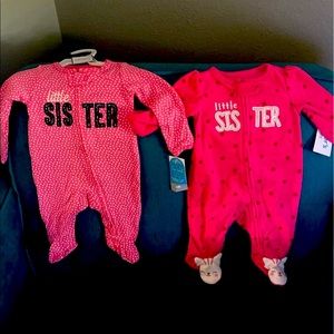 2 Carter’s newborn girl sleepers